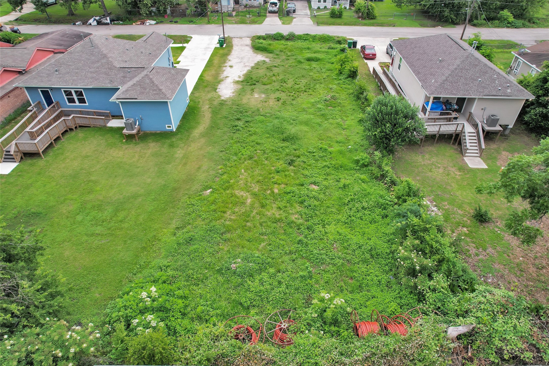 3306 Caplin Street Houston, TX 77026 - Photo 2 of 6 an aerial view of residential houses with outdoor space and trees