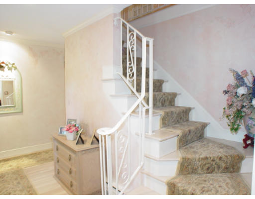 8 Regis Road Andover, MA 01810 - Photo 10 of 16 a view of entryway and hall