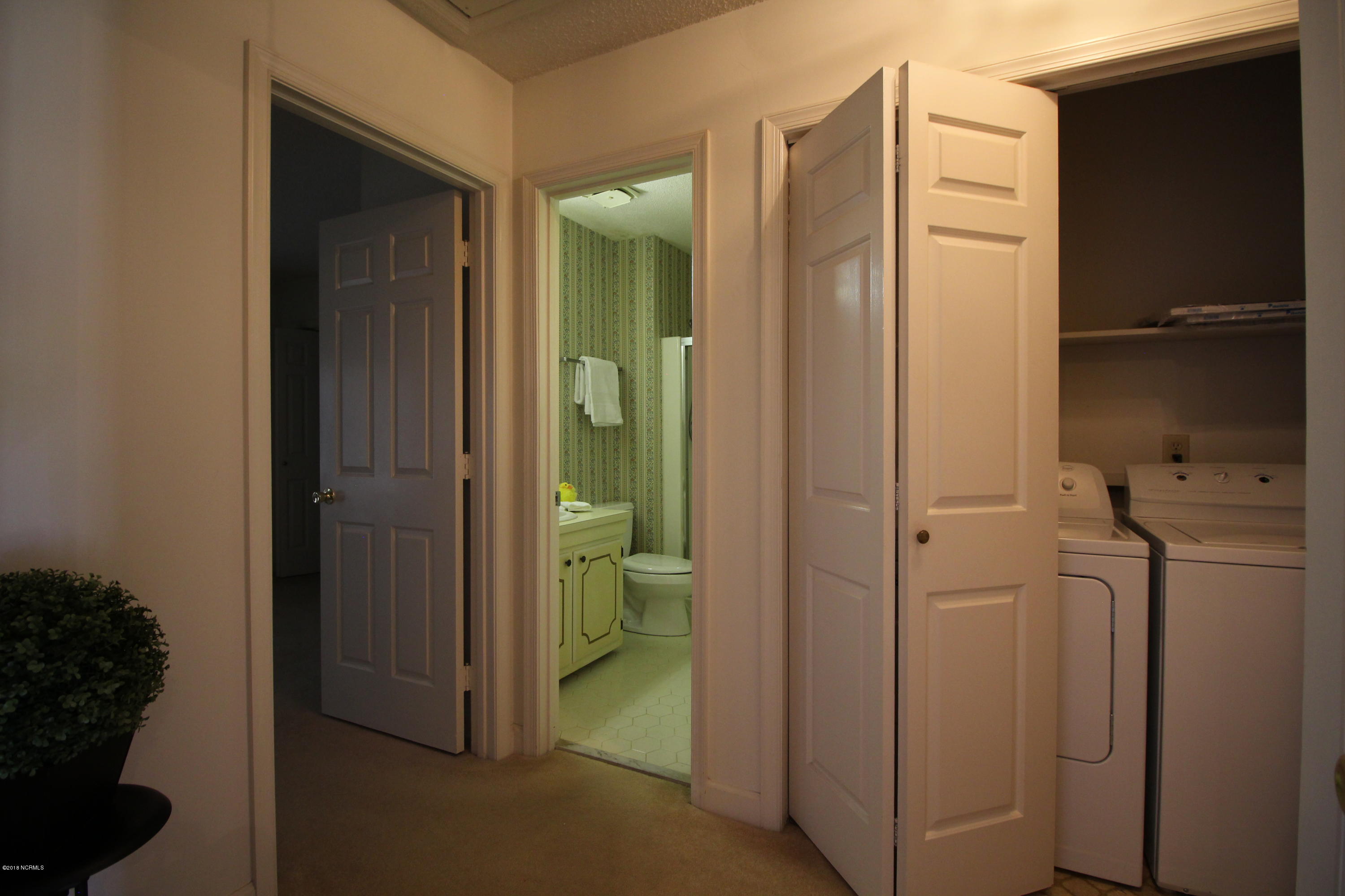 1866 Quail Ridge Road, Unit M Greenville, NC 27858 - Photo 19 of 31 Bedroom Hallway