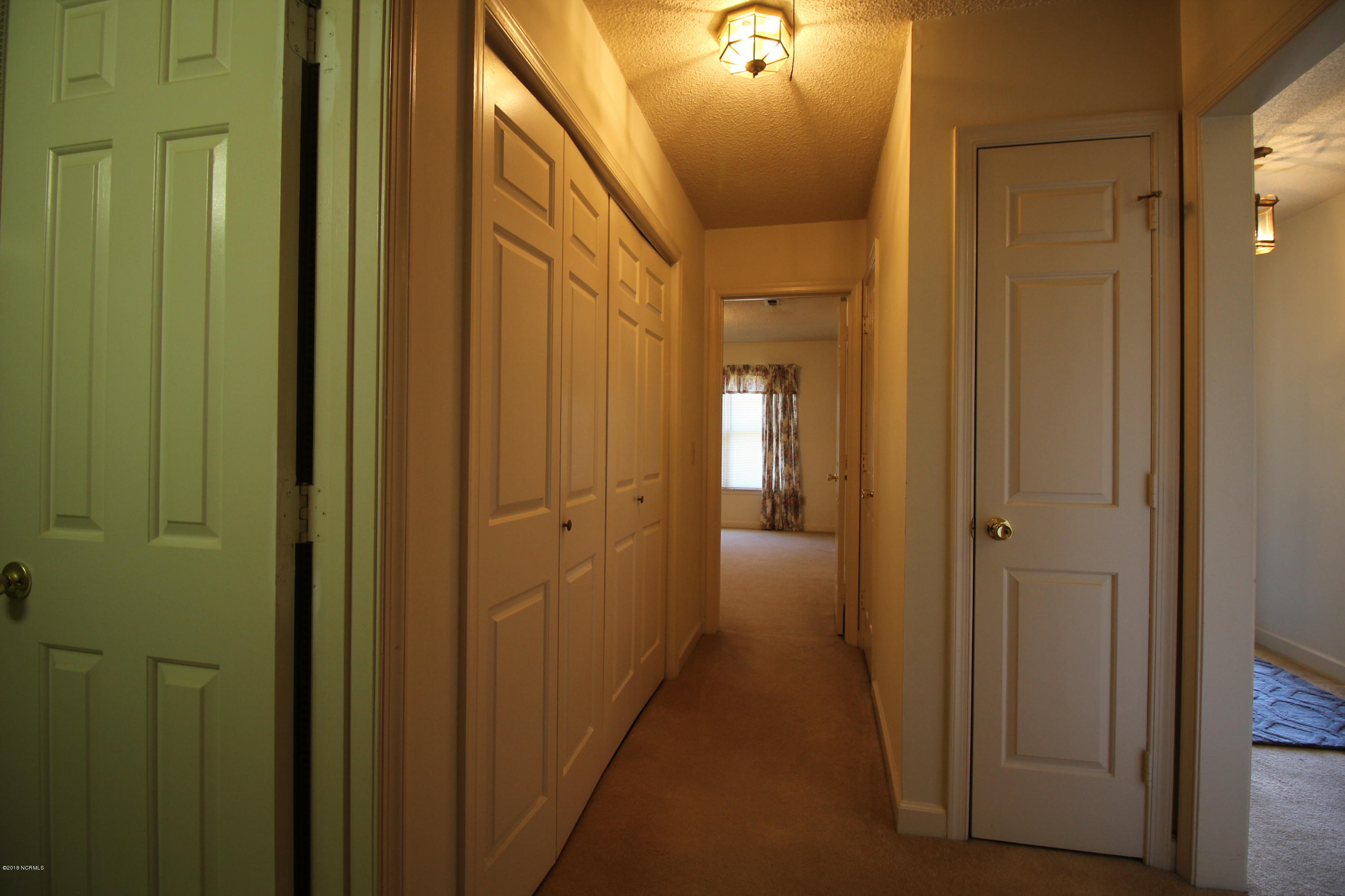 1866 Quail Ridge Road, Unit M Greenville, NC 27858 - Photo 23 of 31 Returning to Bedroom Hallway