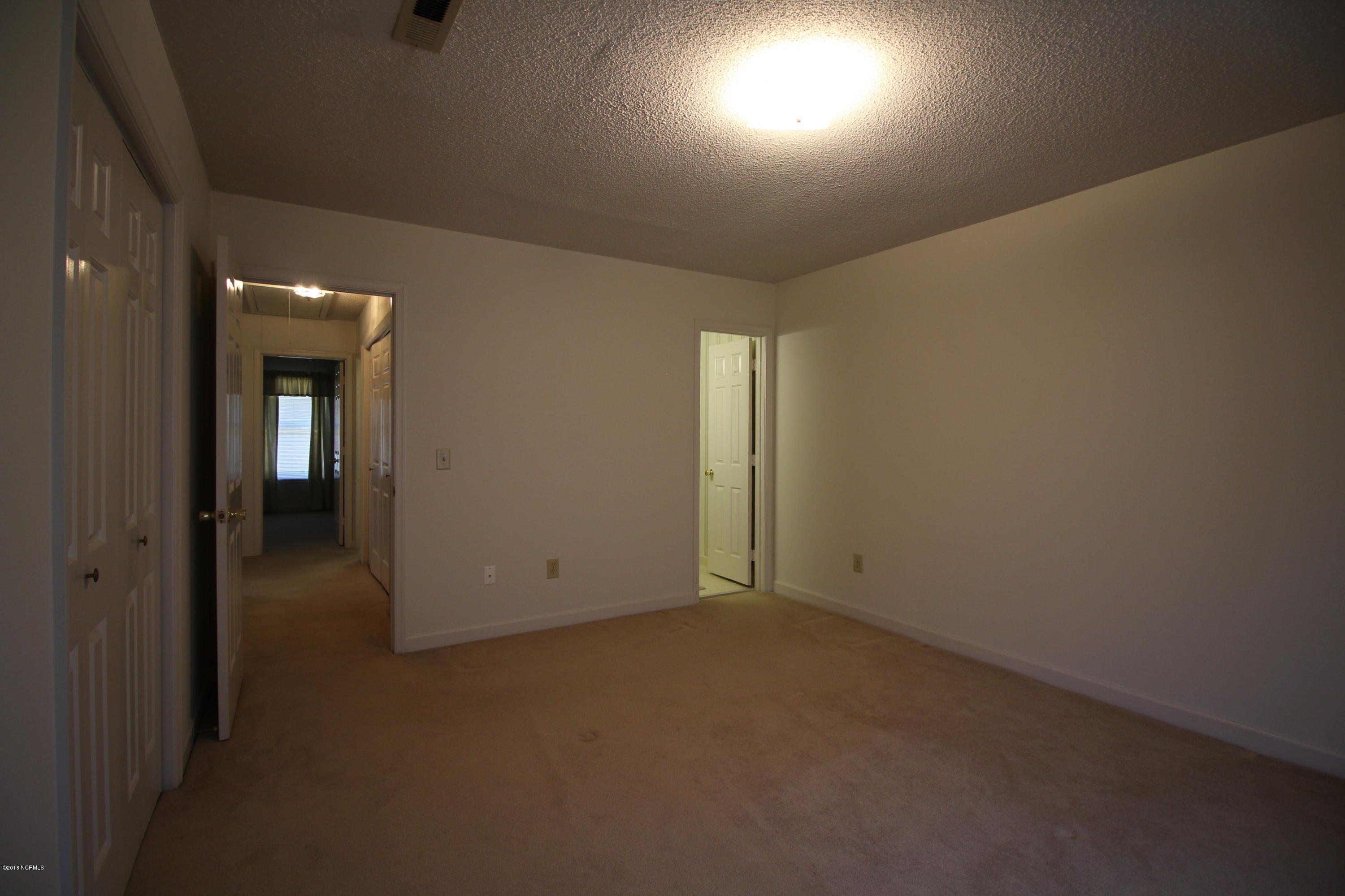 1866 Quail Ridge Road, Unit M Greenville, NC 27858 - Photo 27 of 31 Master to Bath/Hallway