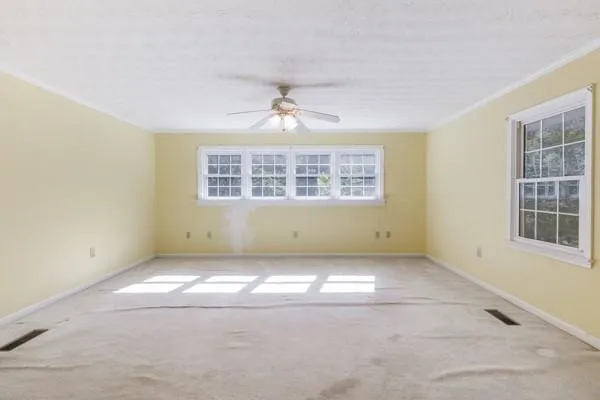 an empty room with windows