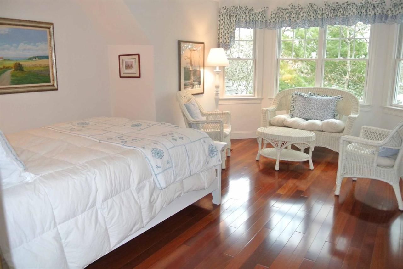 15 Harbor Ridge Road Mashpee, MA 02649 - Photo 18 of 27 a spacious bedroom with a bed and a large window