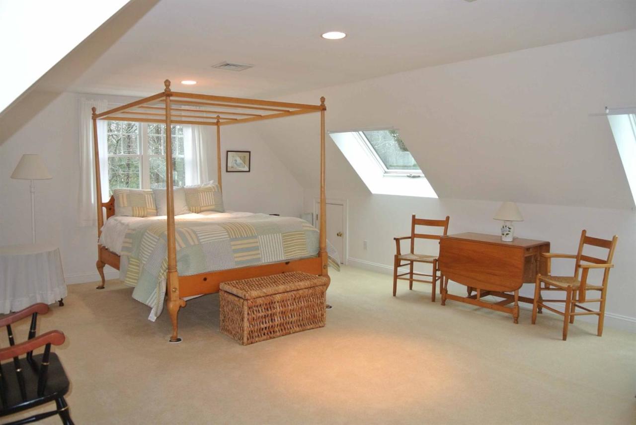 15 Harbor Ridge Road Mashpee, MA 02649 - Photo 19 of 27 a bedroom with furniture and a window