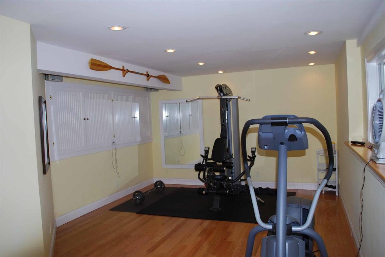15 Harbor Ridge Road Mashpee, MA 02649 - Photo 23 of 27 a room with furniture and wooden floor
