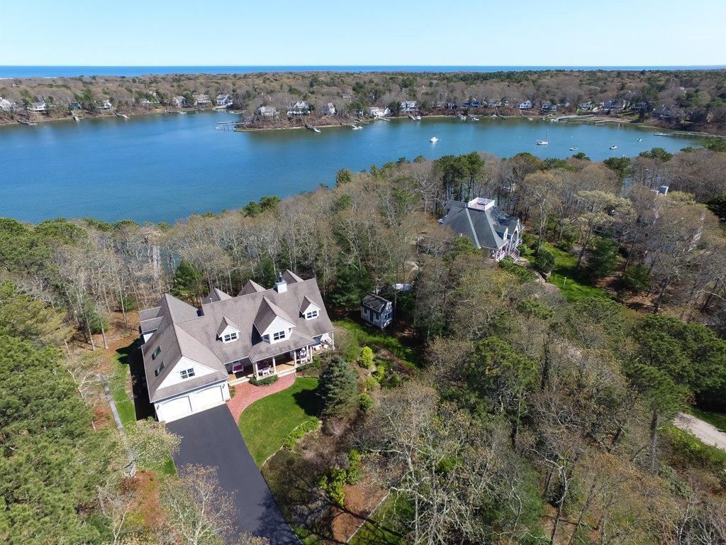 15 Harbor Ridge Road Mashpee, MA 02649 - Photo 25 of 27 an aerial view of a house with outdoor space and lake view