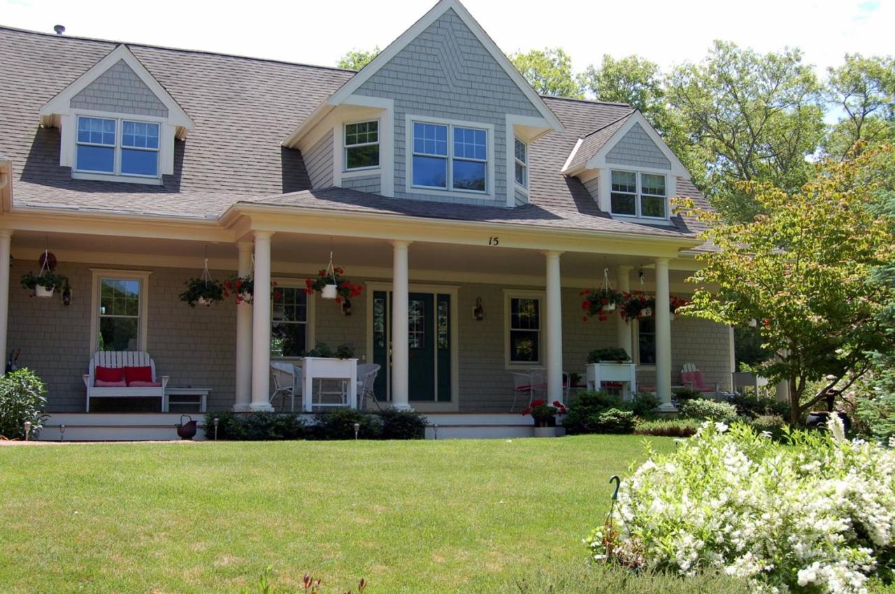 15 Harbor Ridge Road Mashpee, MA 02649 - Photo 4 of 27 front view of a house with a yard