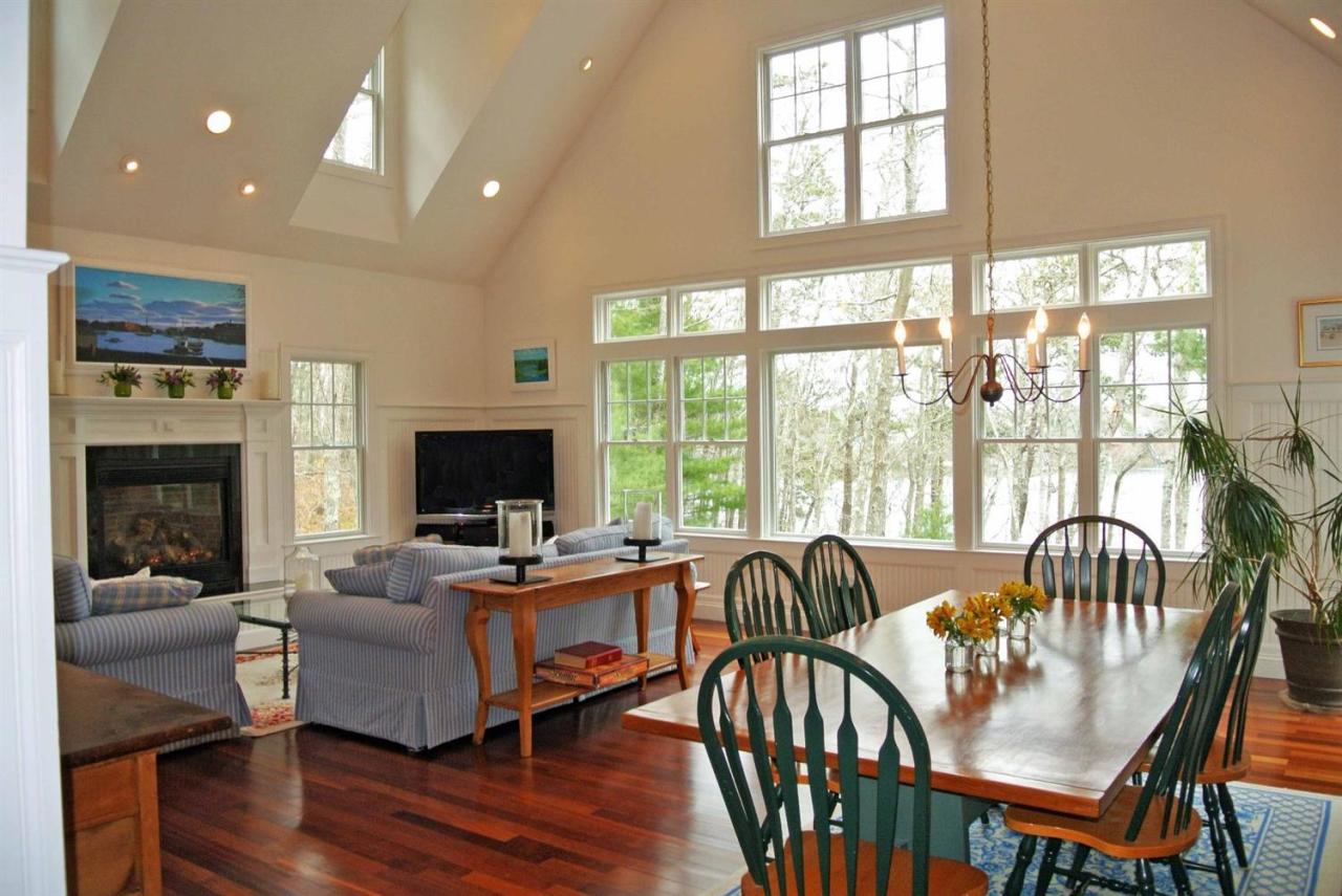 15 Harbor Ridge Road Mashpee, MA 02649 - Photo 10 of 27 a living room with furniture and a fireplace