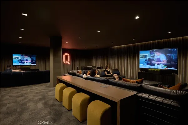 a living room with furniture a rug and a large window