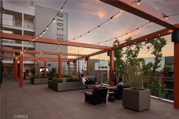 a dinning table and chairs in the patio