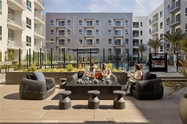 a kitchen with a dining table and chairs