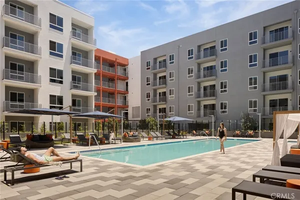 a view of pool with outdoor seating