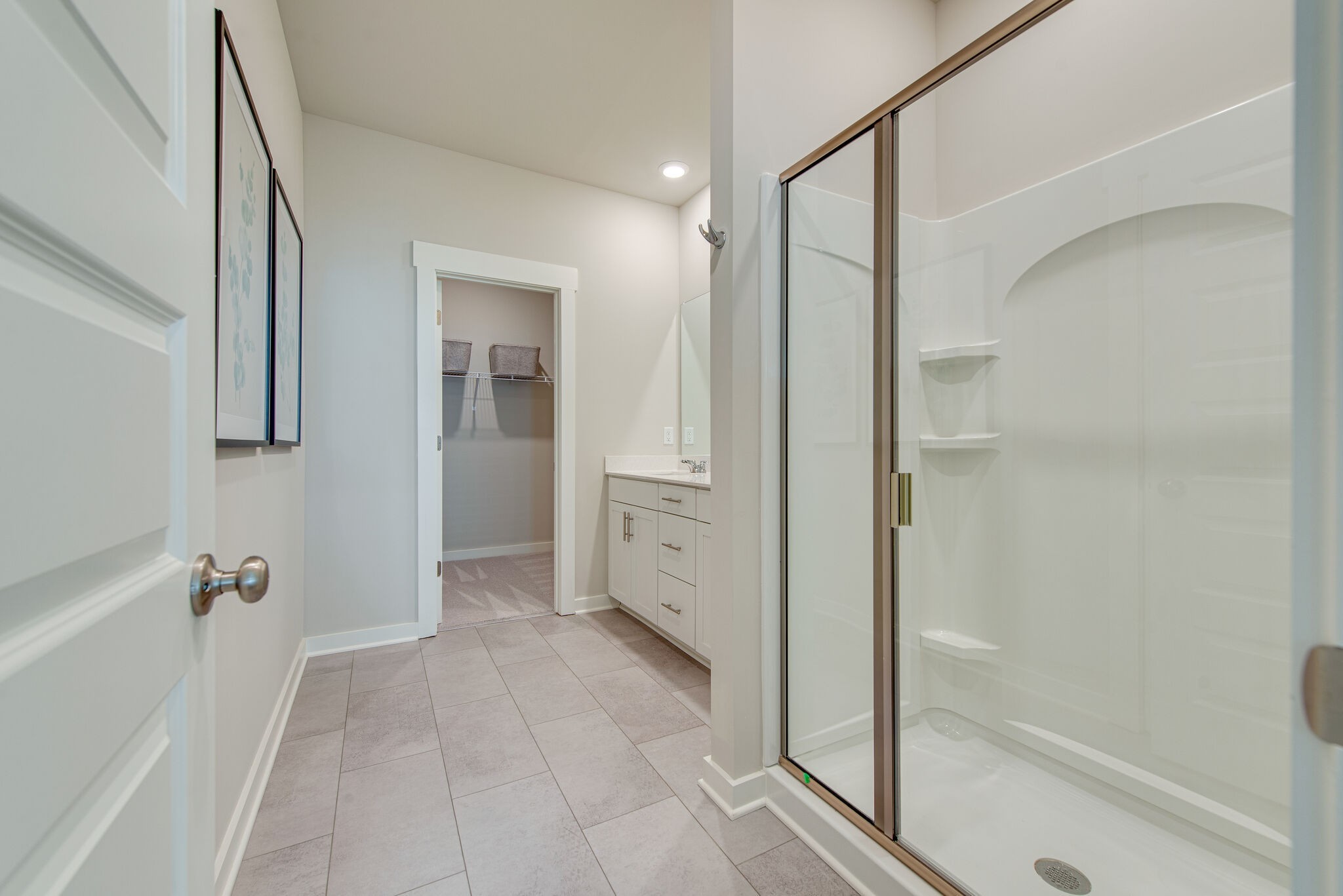 336 Casper Drive Spring Hill, TN 37174 - Photo 7 of 12 a bathroom with a bathtub and a shower