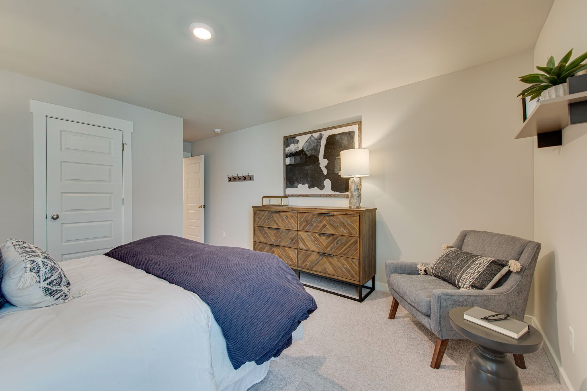 336 Casper Drive Spring Hill, TN 37174 - Photo 10 of 12 a bedroom with a bed and furniture