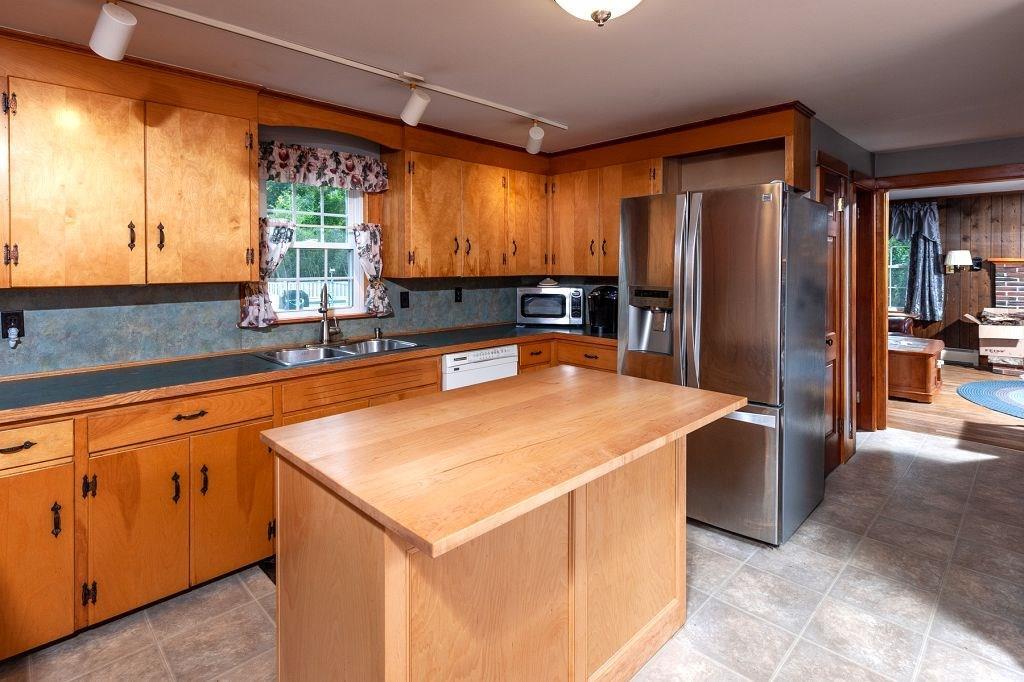 The spacious kitchen with the...