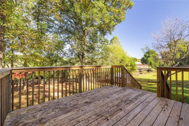 a view of a yard with an outdoor space