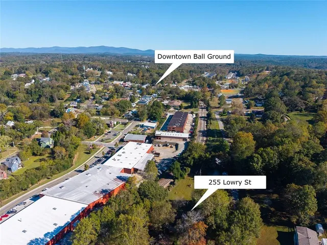 a view of a street with sitting area