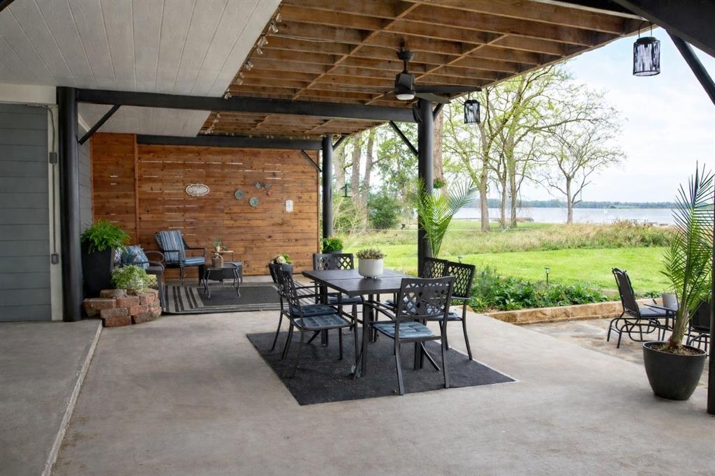 298 Redbud A Mexia, TX 76667 - Photo 3 of 40 a view of a patio with table and chairs and potted plants