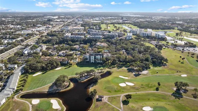 an aerial view of a house with a garden