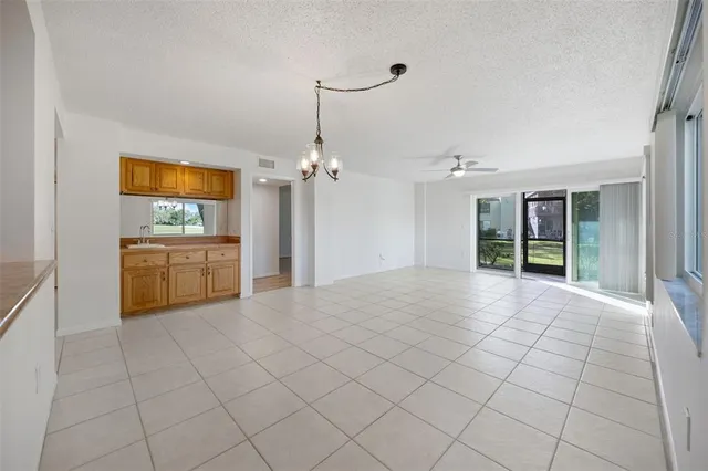 a view of a kitchen with furniture and a kitchen