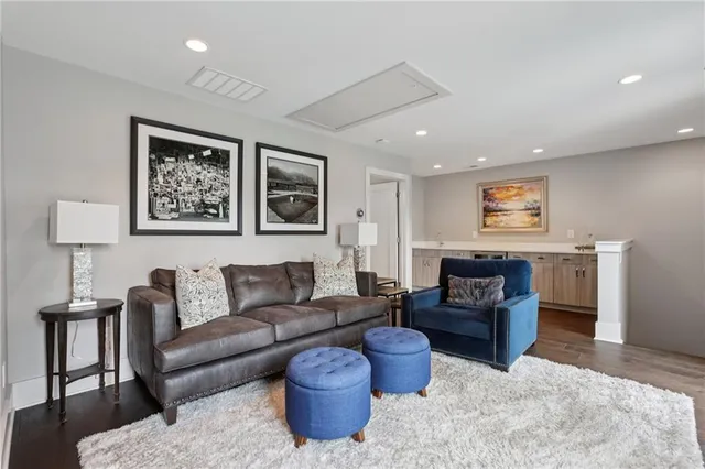 a view of cabinets a sink and a window in a room