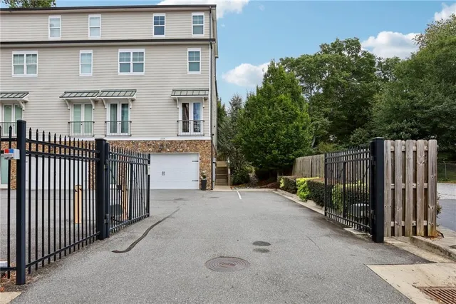 an aerial view of a house with lots of trees