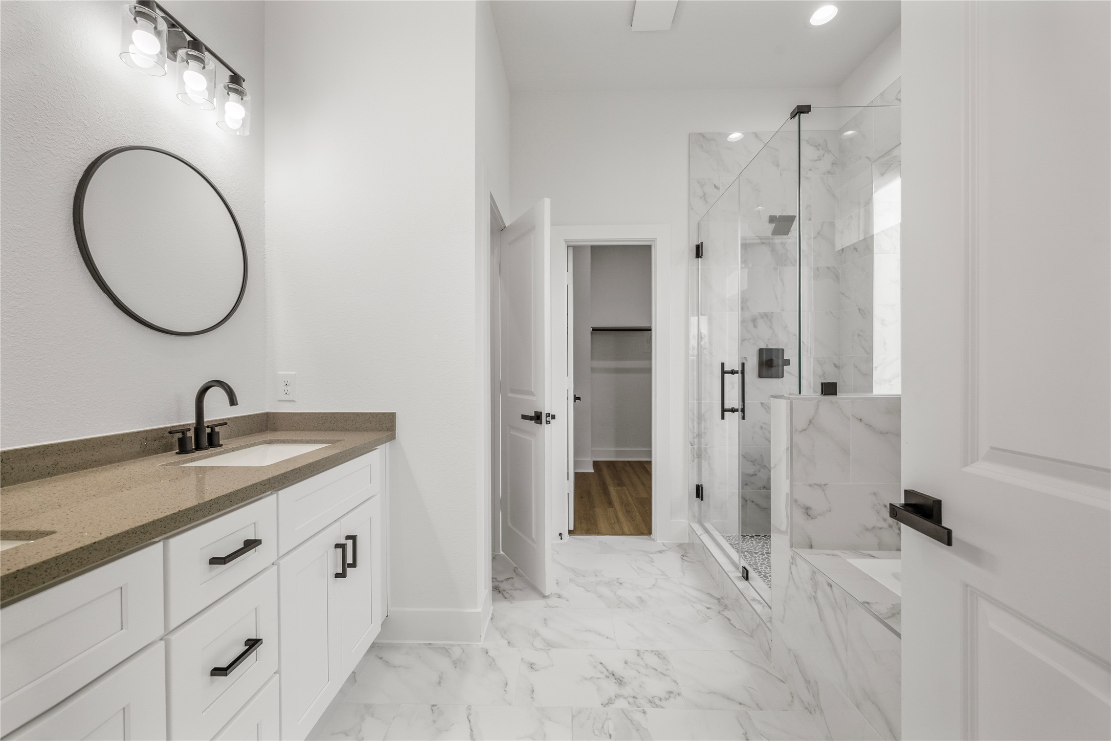7901 Cora Street, Unit B Houston, TX 77088 - Photo 14 of 20 a bathroom with a granite countertop sink mirror and shower