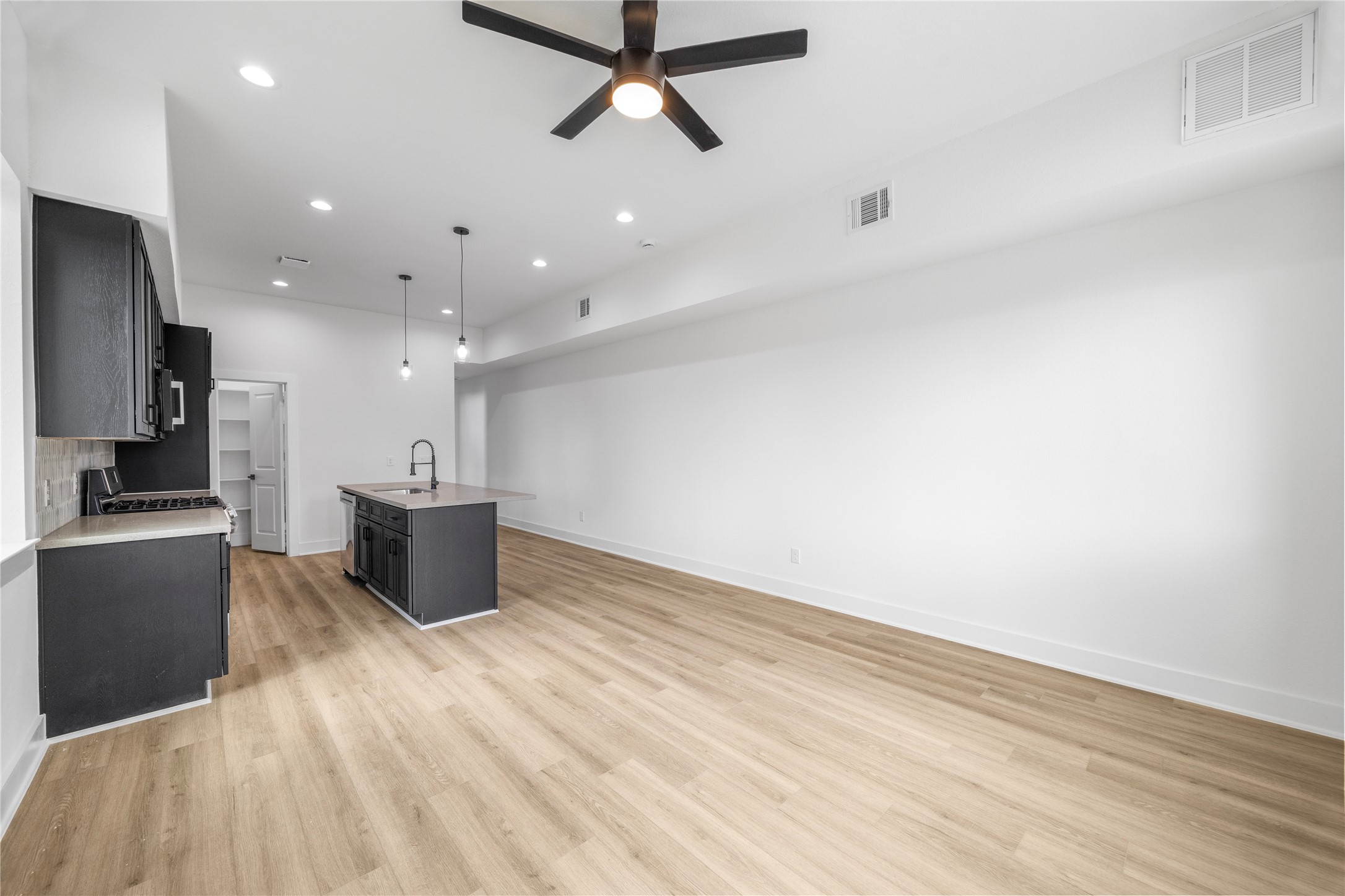 7901 Cora Street, Unit B Houston, TX 77088 - Photo 5 of 20 a view of kitchen and microwave