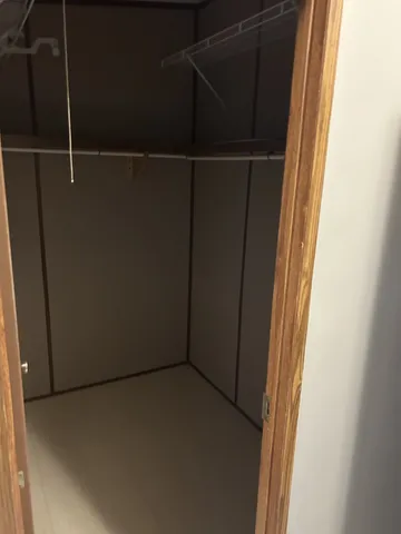 a bathroom with a tub and shower