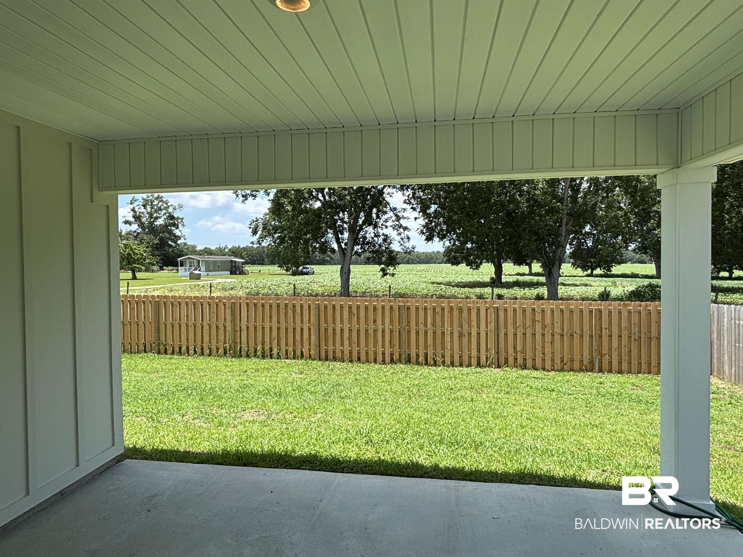 24504 Ponder Loop Loxley, AL 36551 - Photo 5 of 50 View Under Back Patio