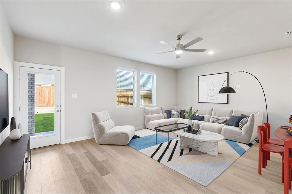 7712 Kingfisher Road Aubrey, TX 76227 - Photo 15 of 39 Living Room in the Haylee home plan by Trophy Signature Homes - REPRESENTATIVE PHOTO