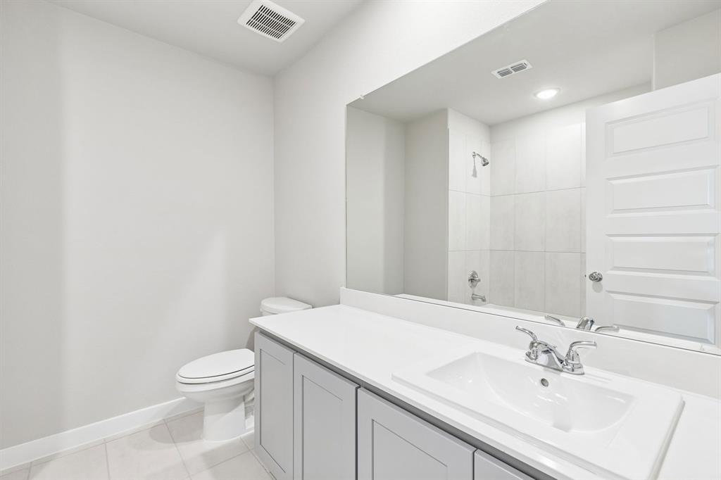 7712 Kingfisher Road Aubrey, TX 76227 - Photo 35 of 39 Bathroom in the Haylee home plan by Trophy Signature Homes - REPRESENTATIVE PHOTO