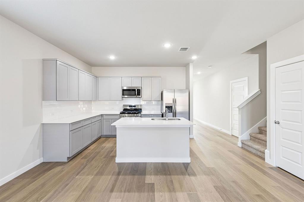 7712 Kingfisher Road Aubrey, TX 76227 - Photo 10 of 39 Kitchen in the Haylee home plan by Trophy Signature Homes - REPRESENTATIVE PHOTO