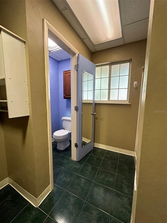 905 Southwest 8th Avenue Gainesville, FL 32601 - Photo 29 of 31 a bathroom with a toilet