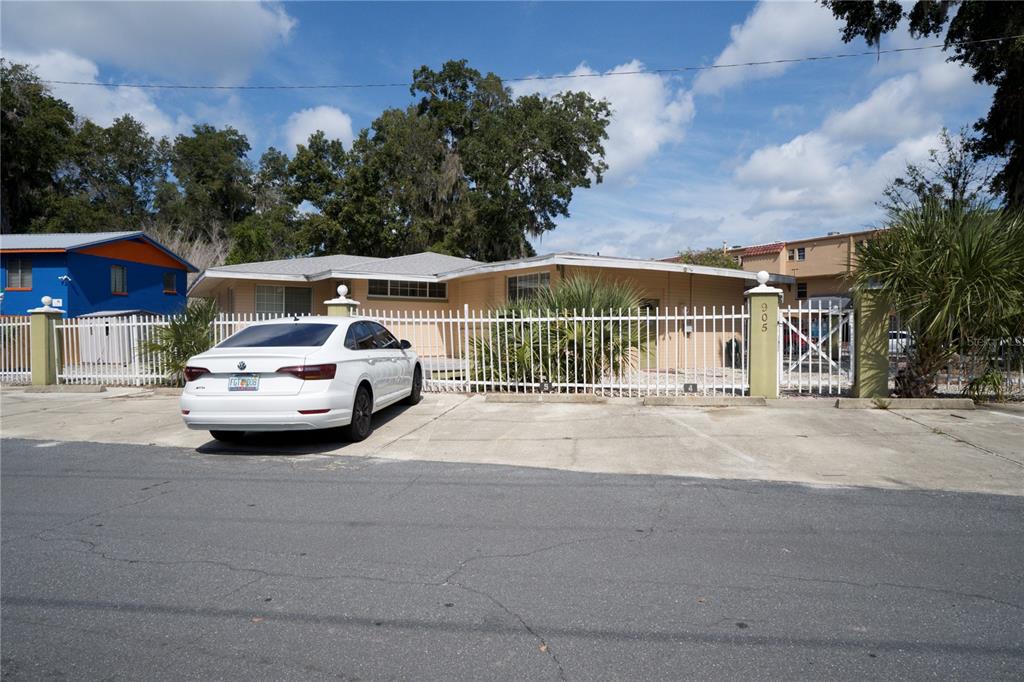 905 Southwest 8th Avenue Gainesville, FL 32601 - Photo 3 of 31 a car parked on the side of the road