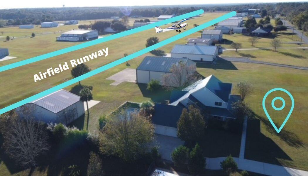 1510 Vinson Ray Road Baker, FL 32531 - Photo 60 of 60 an aerial view of a houses with a yard