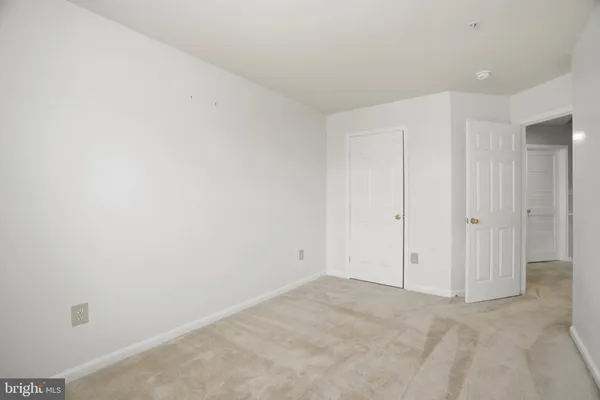 a bathroom with a sink toilet vanity and shower
