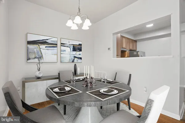 a kitchen with a stove sink and refrigerator