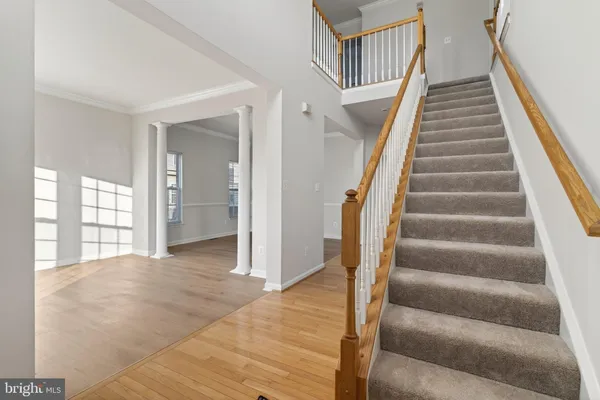 a view of an entryway with staircase