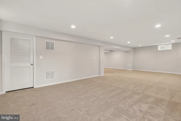 a view of balcony with wooden floor