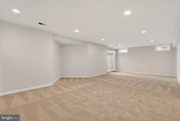 a view of balcony with wooden floor