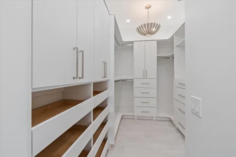 a bathroom with a double vanity and a sink