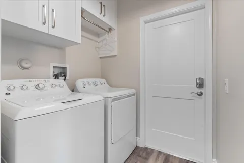 a utility room with dryer and washer