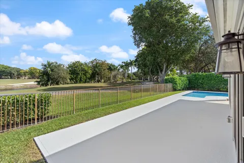 a view of a balcony with a lake view