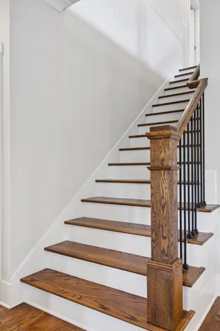 a bathroom with a shower and a bath tub