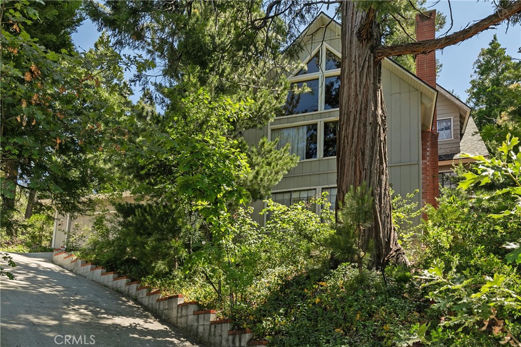 329 Grass Valley Road Lake Arrowhead, CA 92352 - Photo 3 of 31 a view of a house with a tree