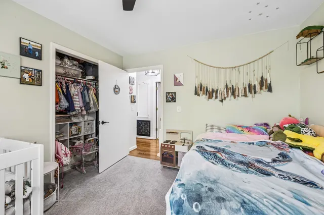 a view of a house with yard and a garden