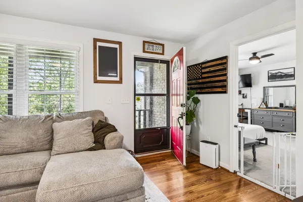 front view of a house with potted plants