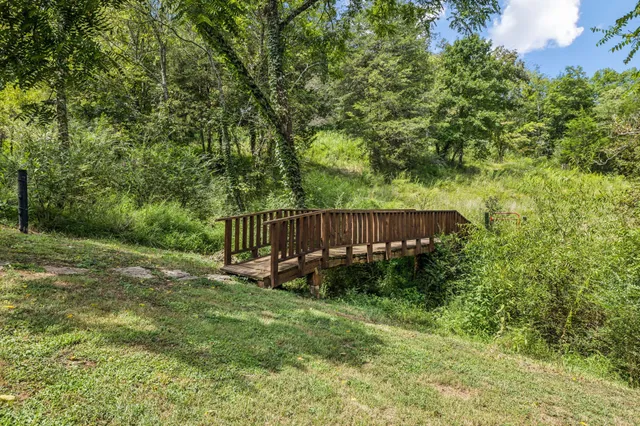 an aerial view of a town with trees