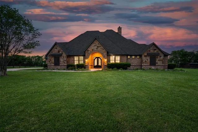 a house view with a garden space